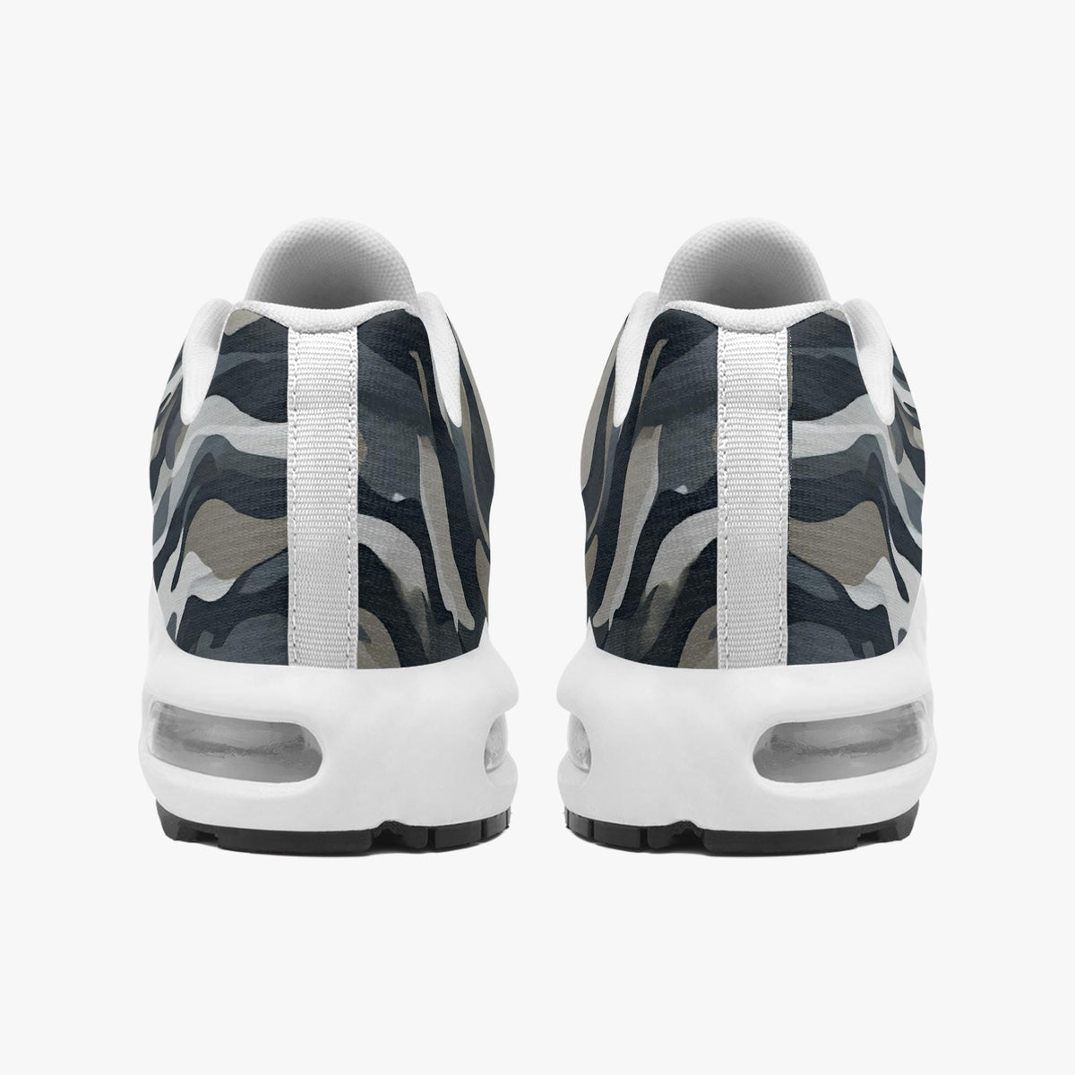A pair of Nike Air Max 90 sneakers shown from the back, featuring a dark gray and black camouflage pattern with white stripes and a white midsole.