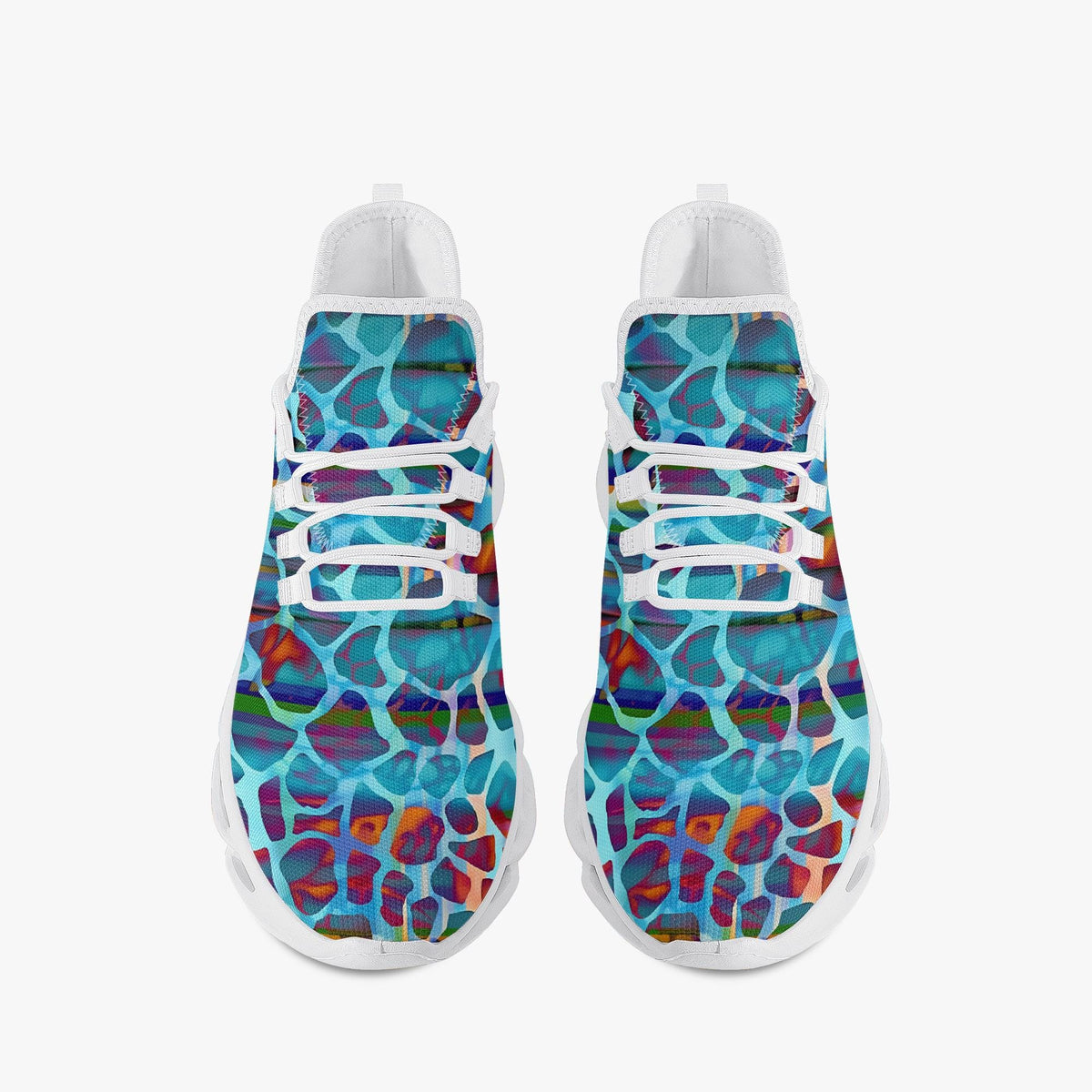 A pair of low-top sneakers shown from the front on a light gray background. The uppers feature a colorful abstract pattern with swirling blue, teal, purple, red, and orange shapes over a white base, with white laces and white soles.
