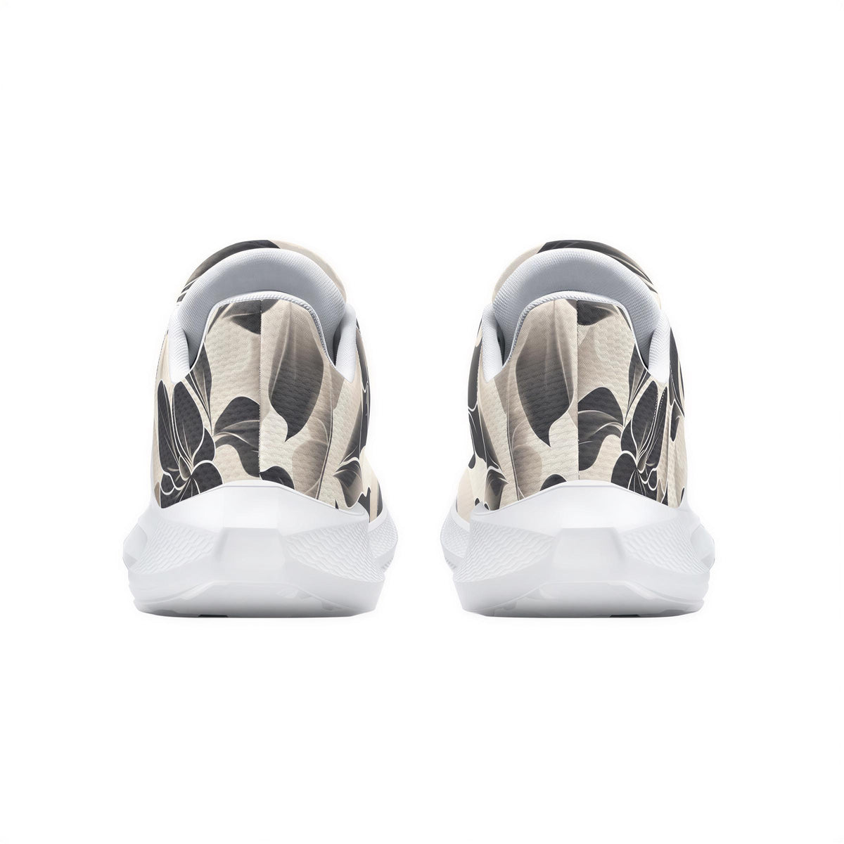A pair of white sneakers with a black and white floral pattern on the back.