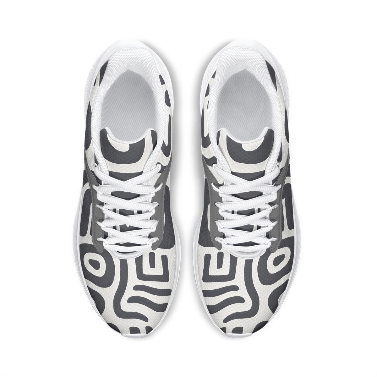 A pair of white and black patterned sneakers with a distinctive design.