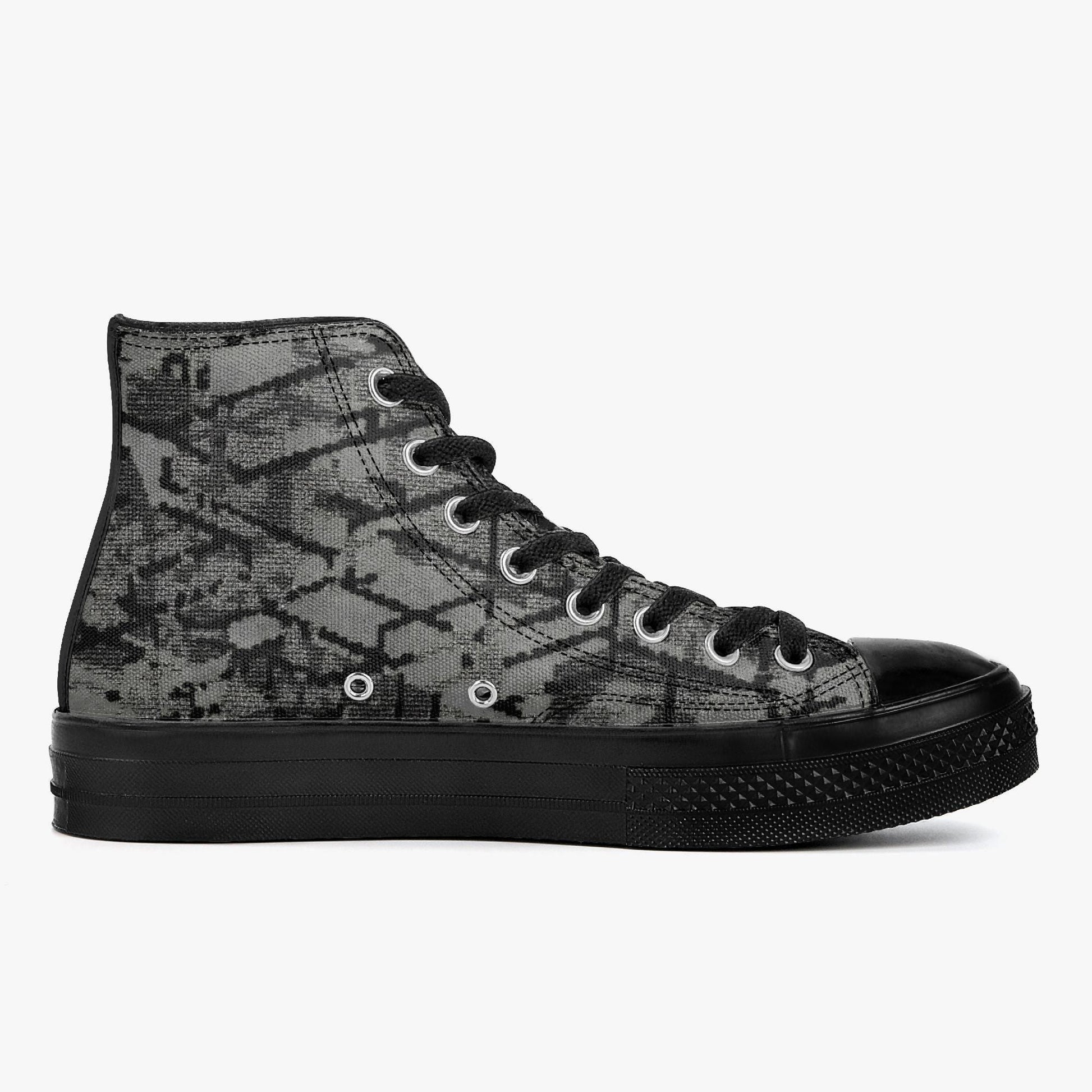 A black and grey high-top sneaker with a distinctive patterned design.