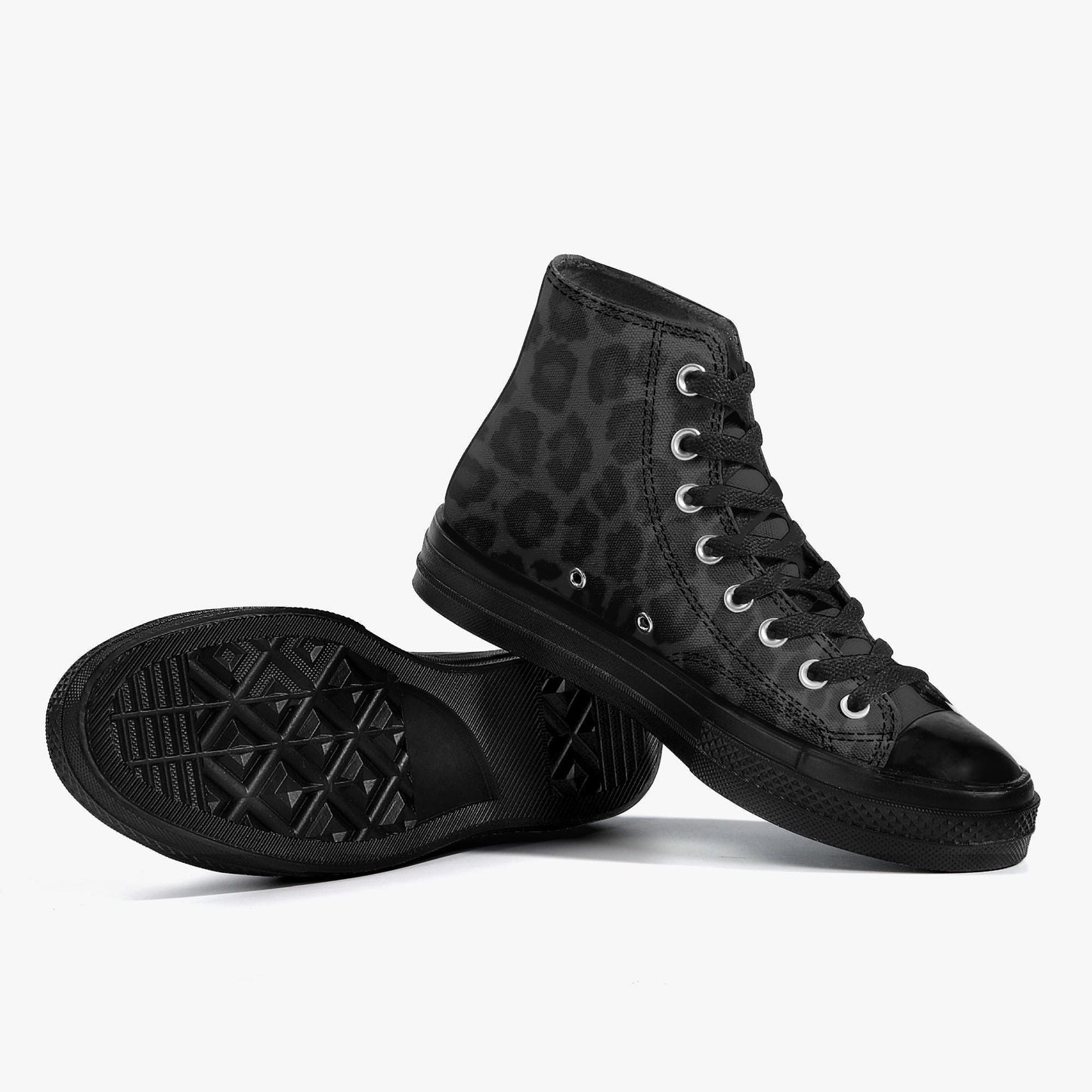 A pair of black high-top sneakers with a leopard print pattern.