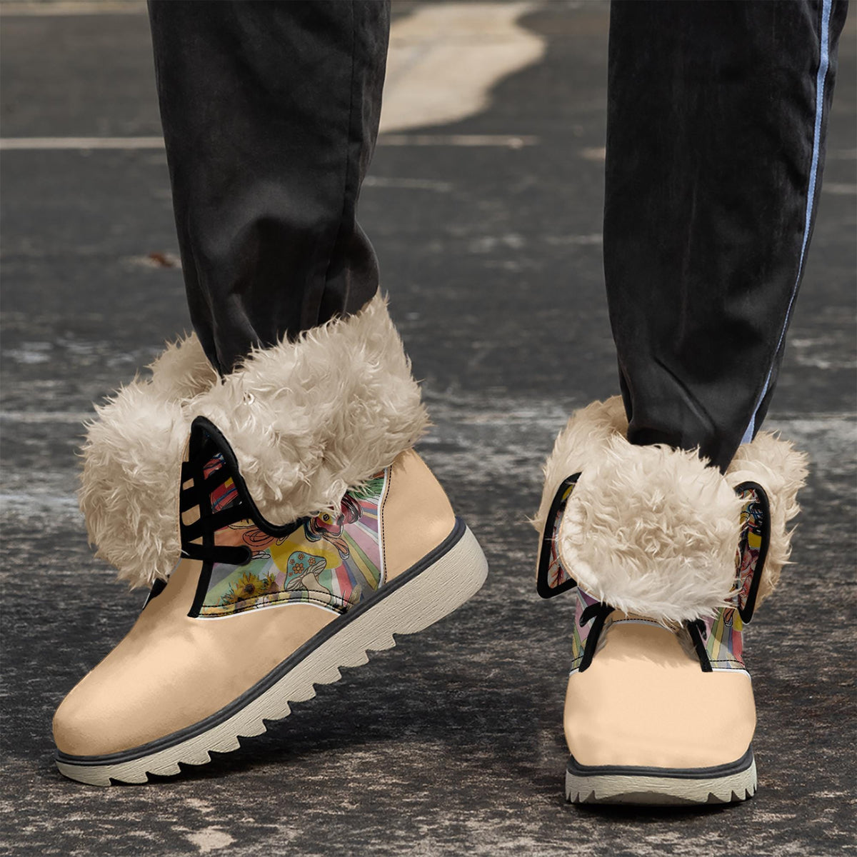 A close-up of a person's feet wearing tan and white furry boots with colorful floral patterns.