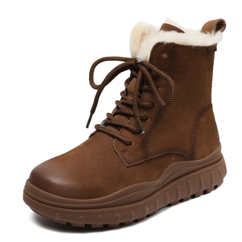 Single brown snow boot angled to show the wool and faux fur lining and lace-up front