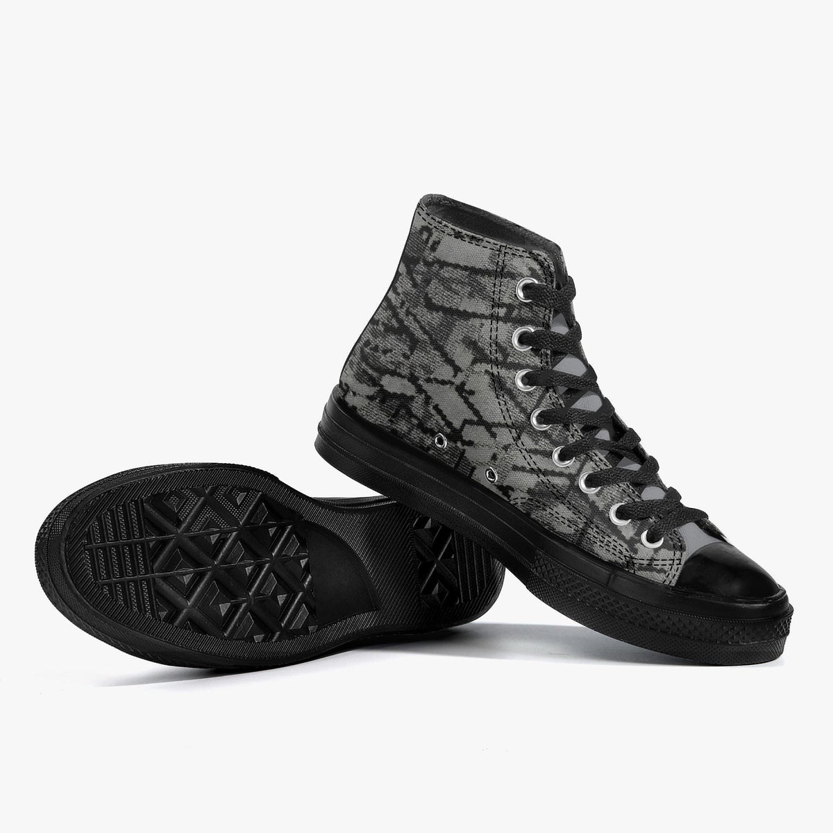 A pair of black and gray high-top sneakers with a distinctive patterned design.