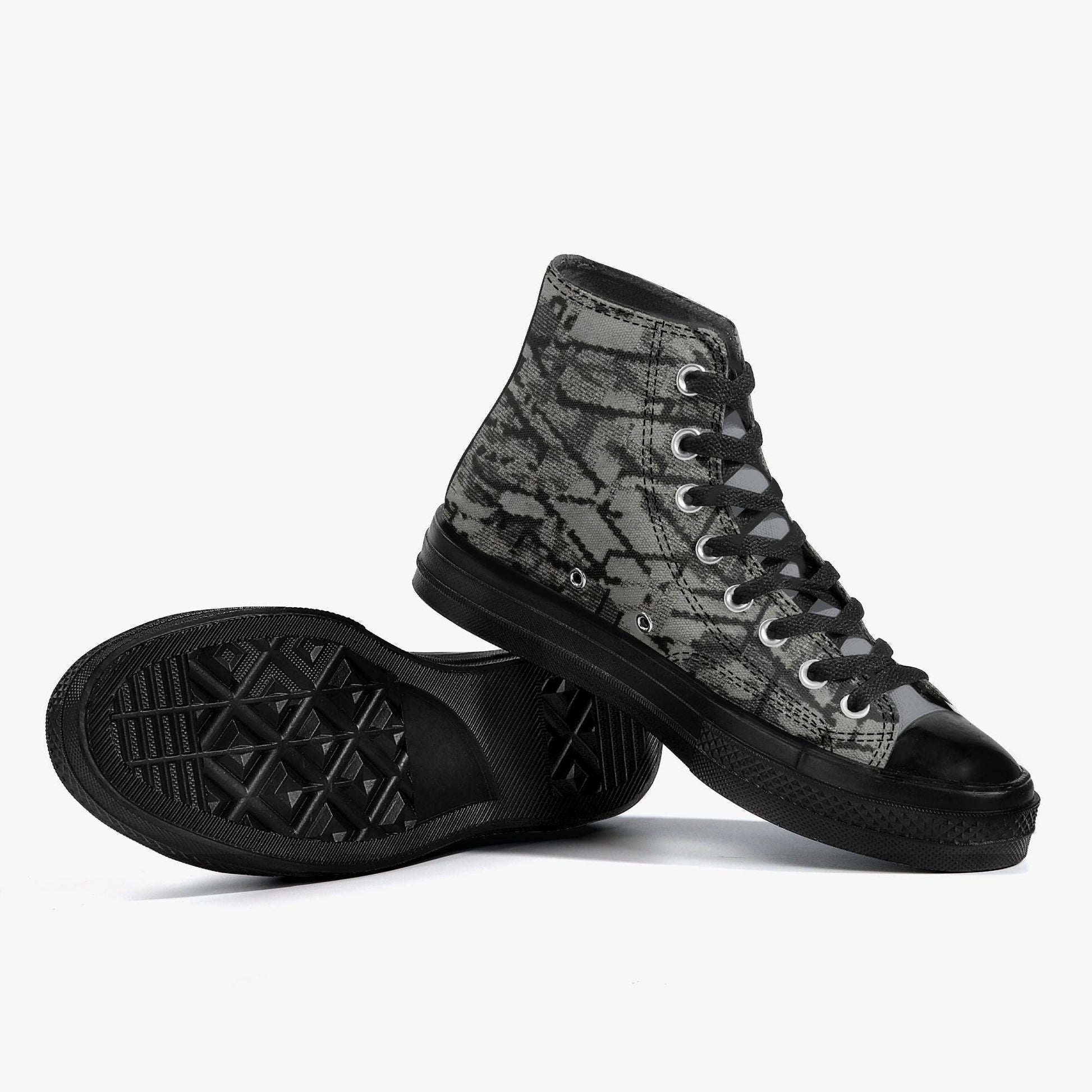 A pair of black and gray high-top sneakers with a distinctive patterned design.