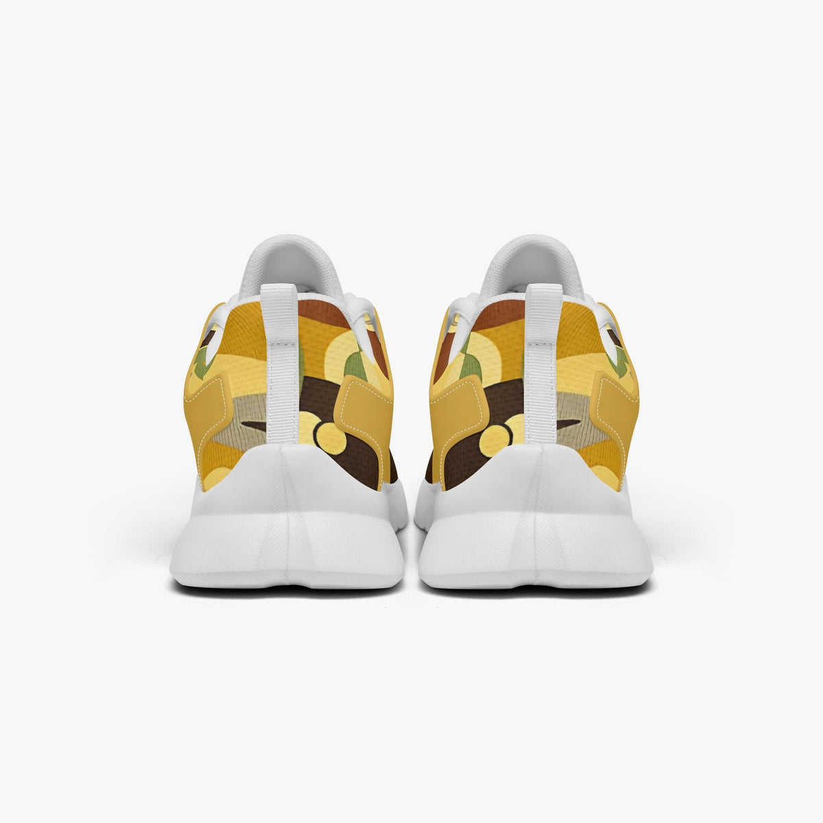 A pair of white sneakers with a colorful, abstract pattern on the back.