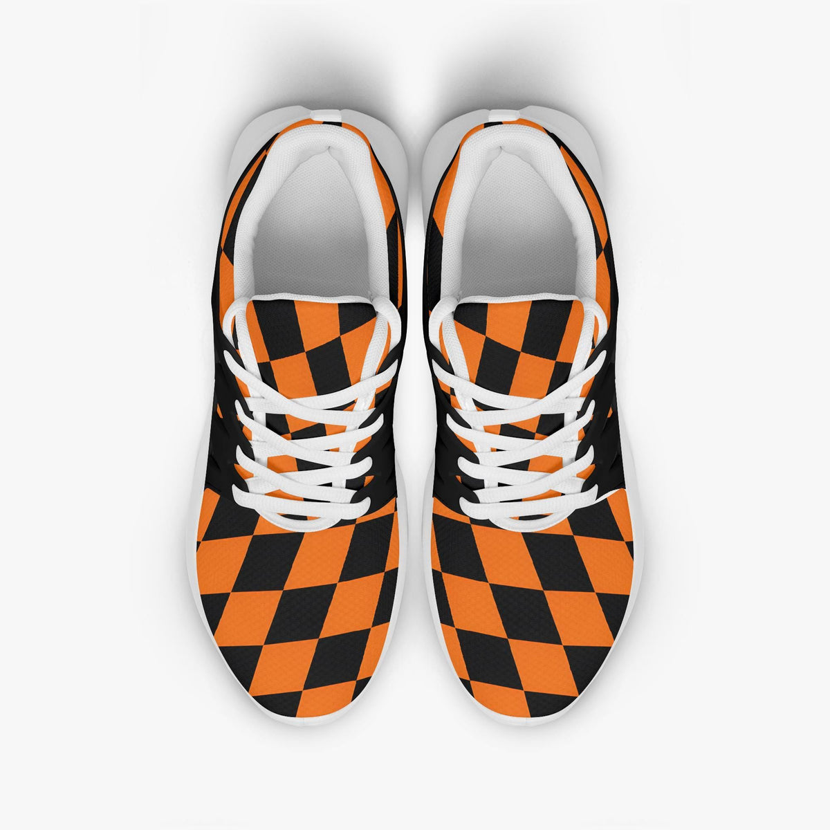 A pair of black and orange checkered sneakers with white laces.