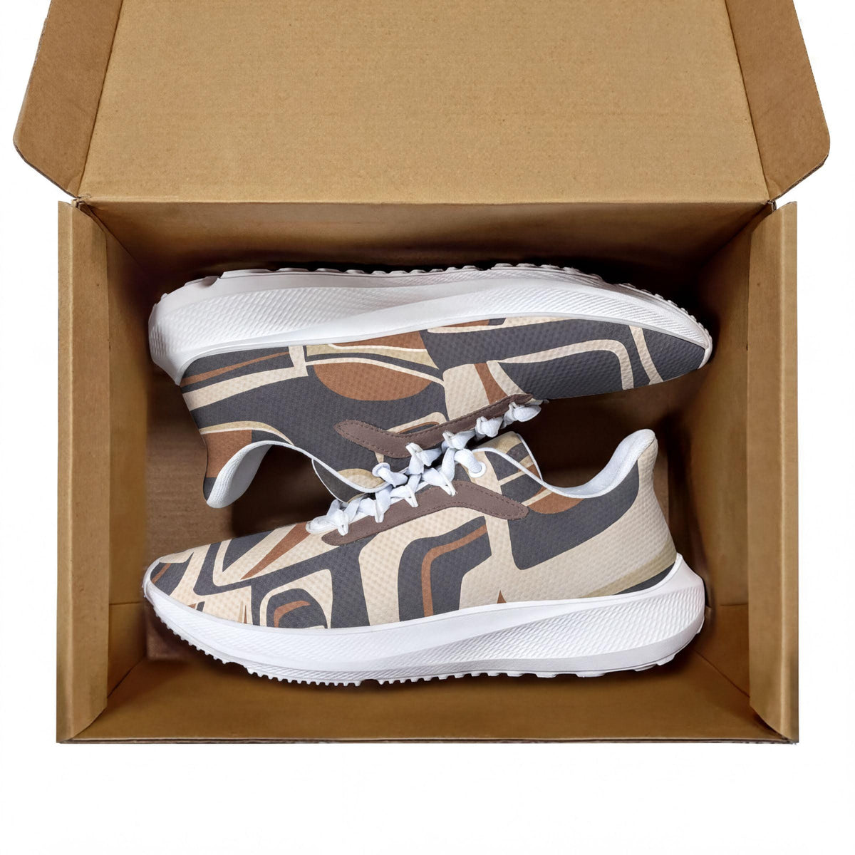 A pair of patterned sneakers is shown inside a cardboard box.