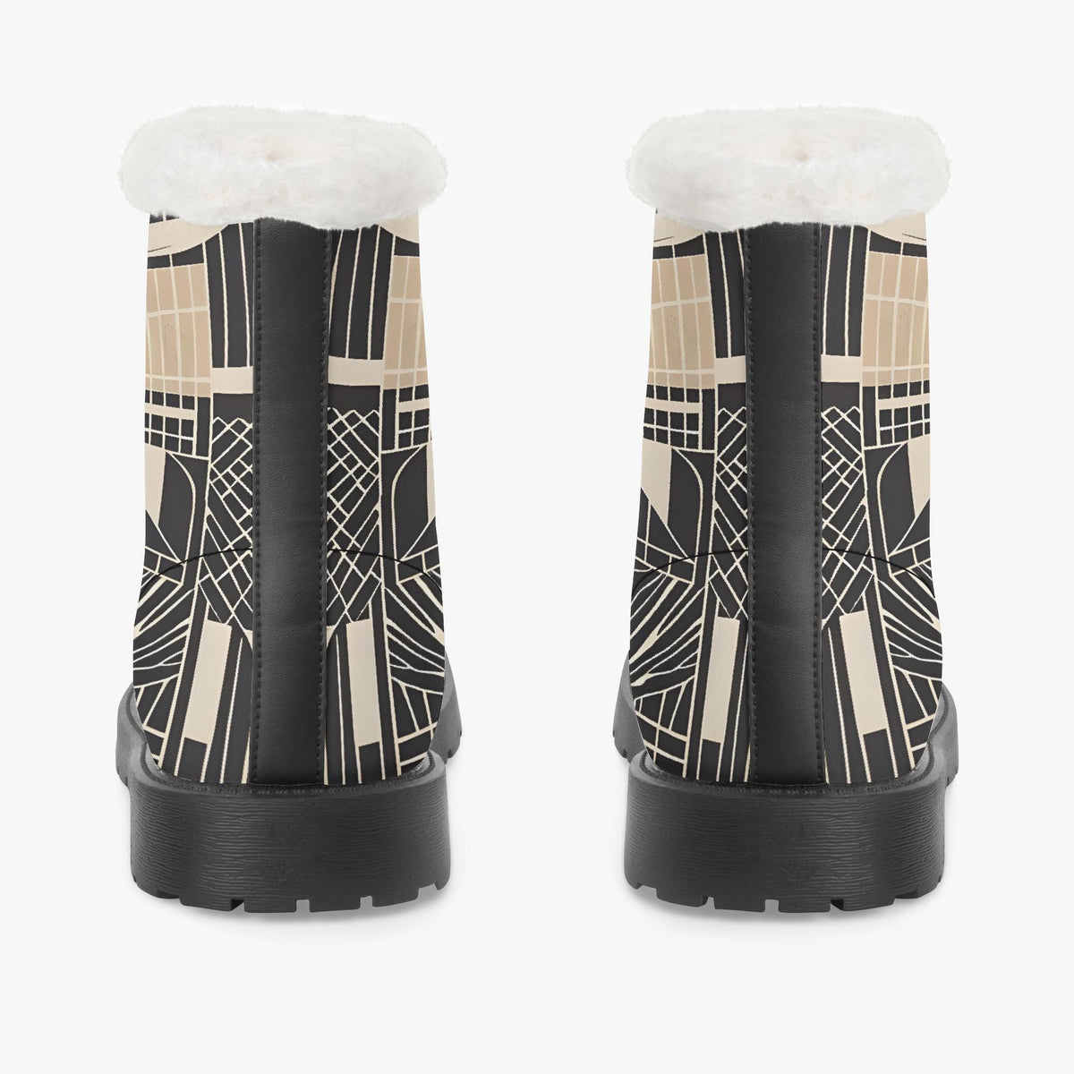 a pair of black and white boots with a geometric pattern on the side.