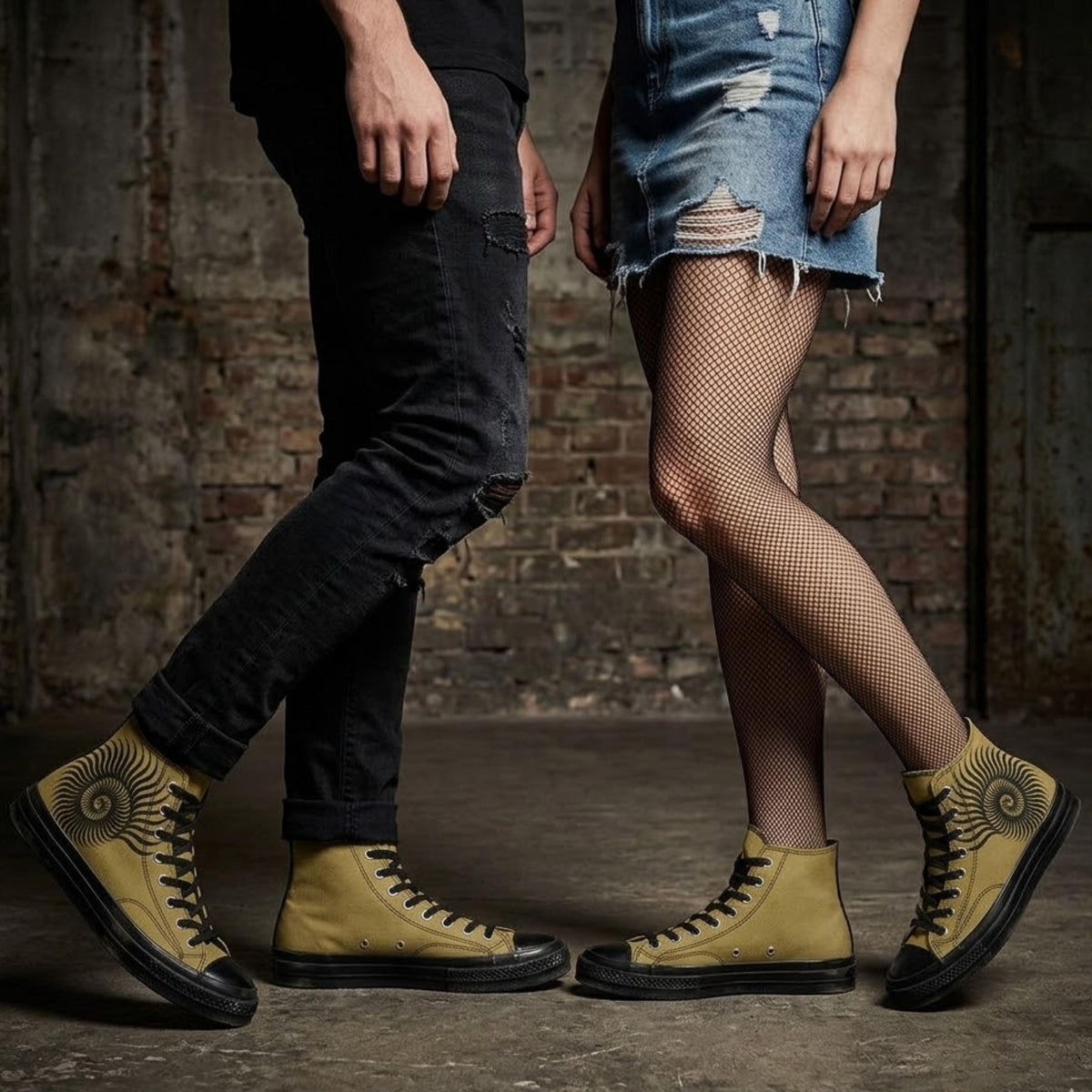 A man and a woman standing side by side, both wearing yellow high-top sneakers with a distinctive design.