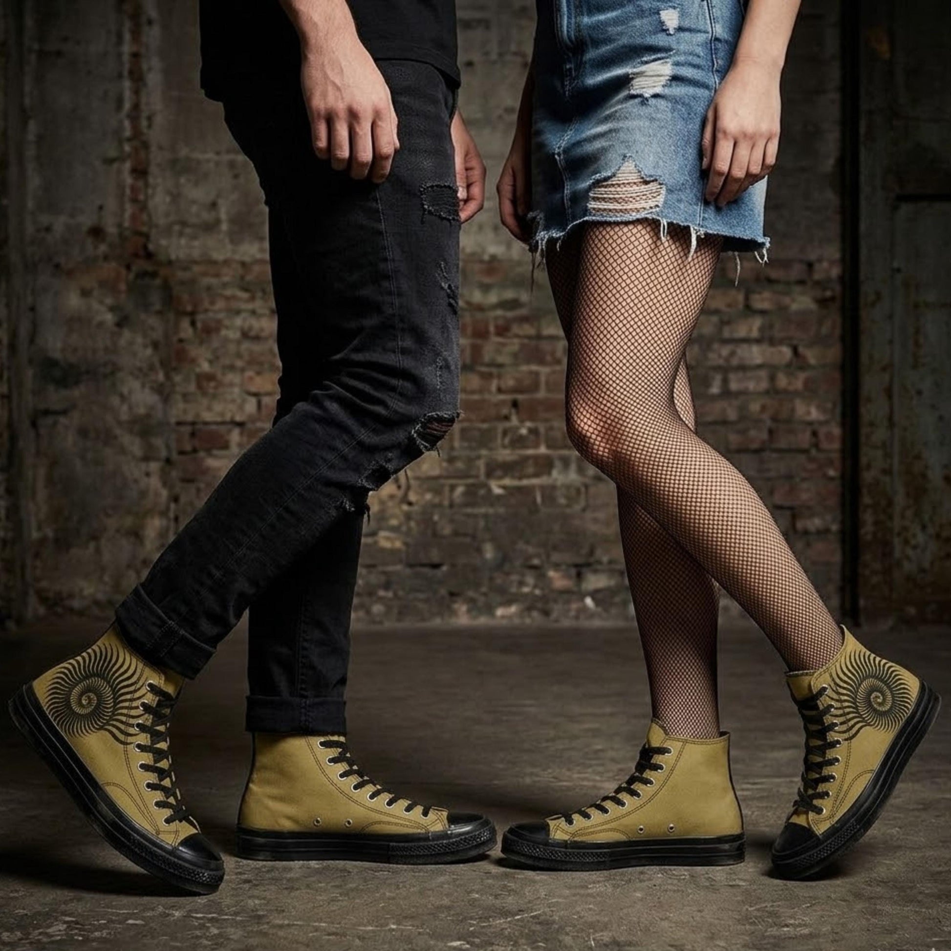 A man and a woman standing side by side, both wearing yellow high-top sneakers with a distinctive design.