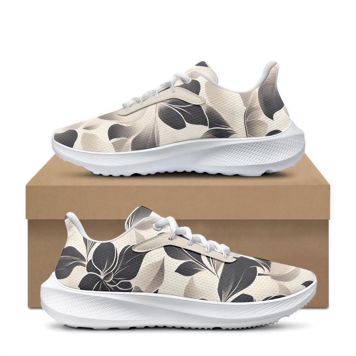 A pair of white sneakers with a floral pattern on the side, placed on top of a cardboard box.