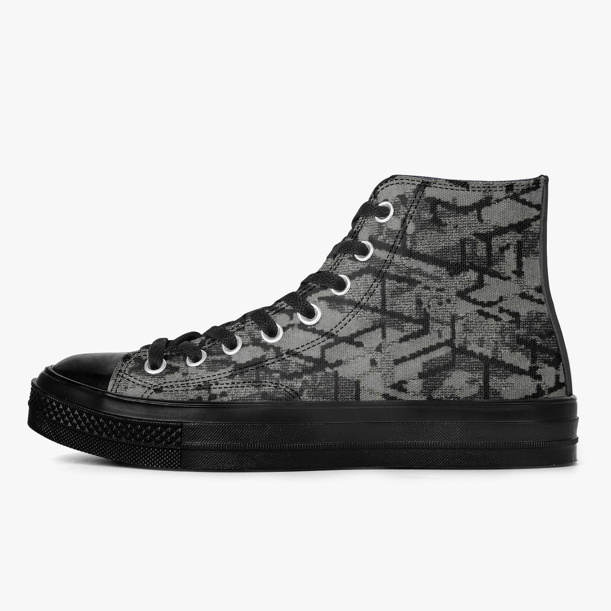 A black and gray high-top sneaker with a geometric pattern on the side.