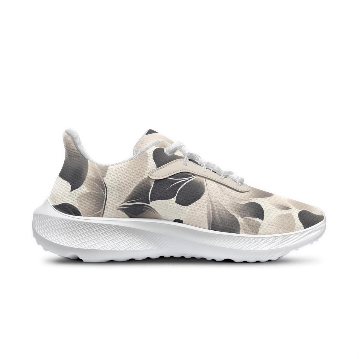 A white and grey camouflage-patterned sneaker with a white sole and laces.