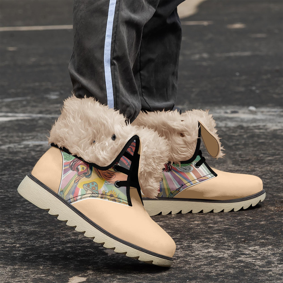 A close-up of a person's feet wearing tan and white boots with fur trim, standing on a black surface.