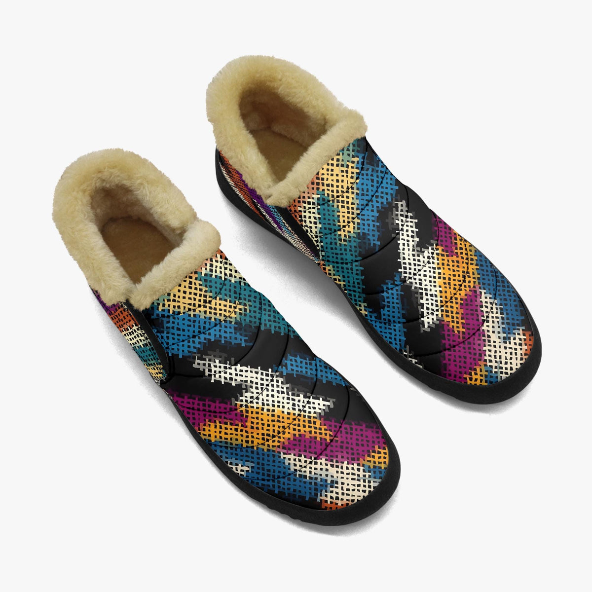A pair of colorful, patterned slippers with a furry lining.