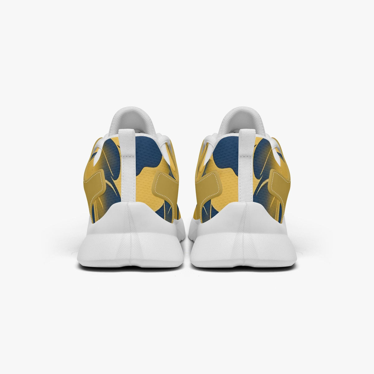 A pair of white sneakers with a colorful, abstract pattern on the back.
