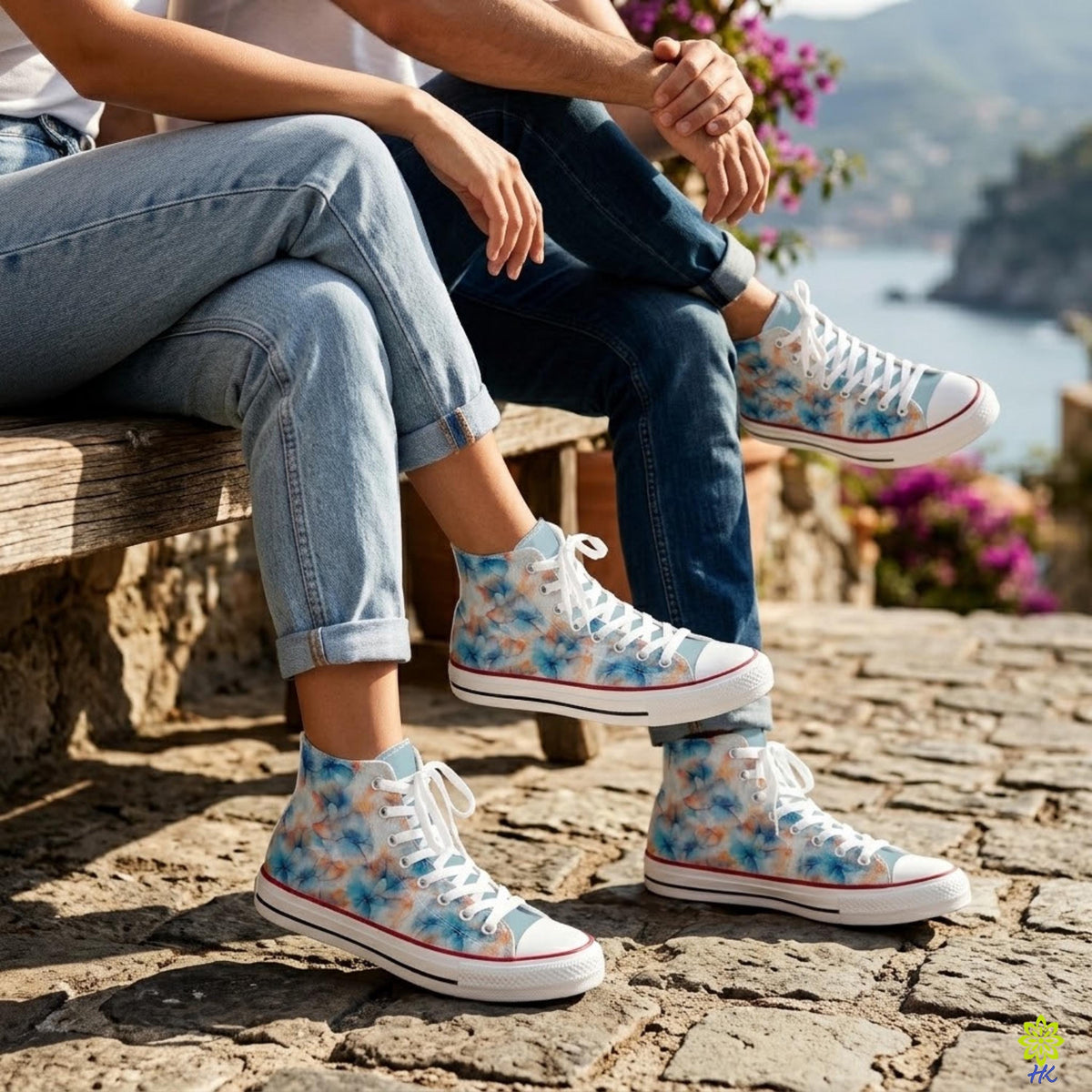 Twee personen op een stenen bank met aquarel bloemen high-top sneakers in beeld