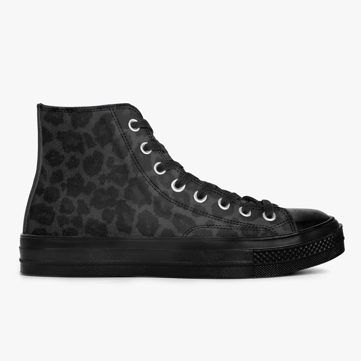 A black and grey high-top sneaker with a leopard print pattern.