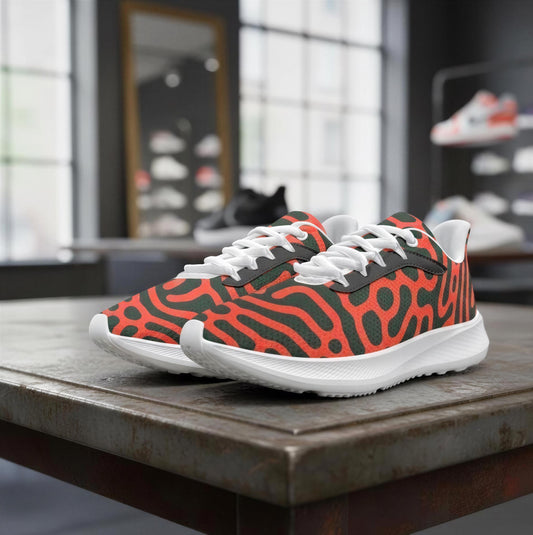 A pair of vibrant, patterned sneakers with a bold, animal-inspired design are displayed on a table.