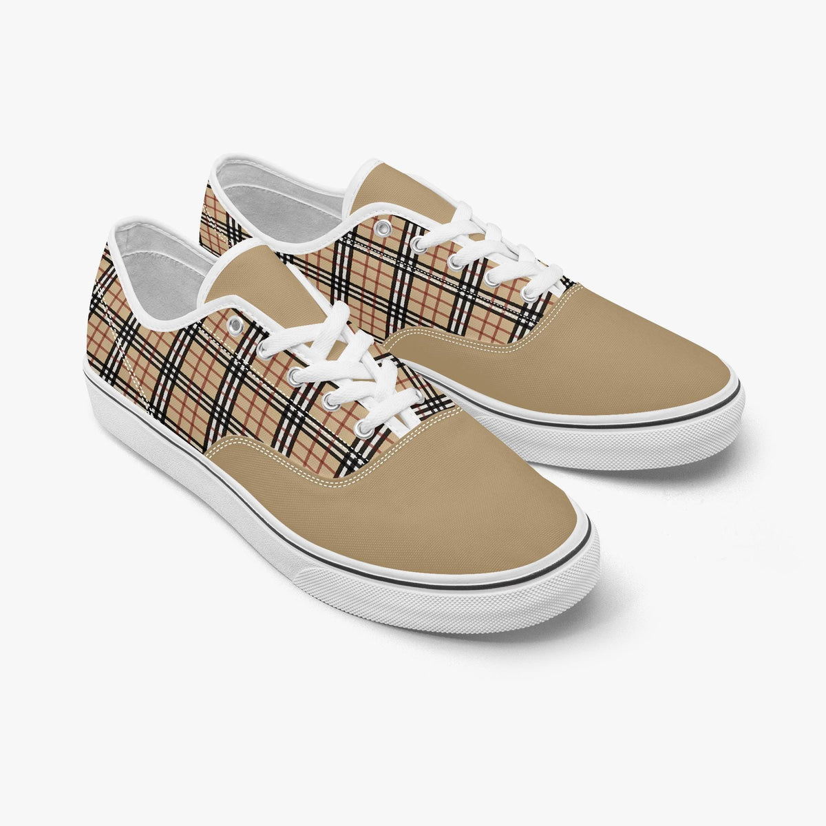 A pair of tan and black plaid sneakers with white laces.