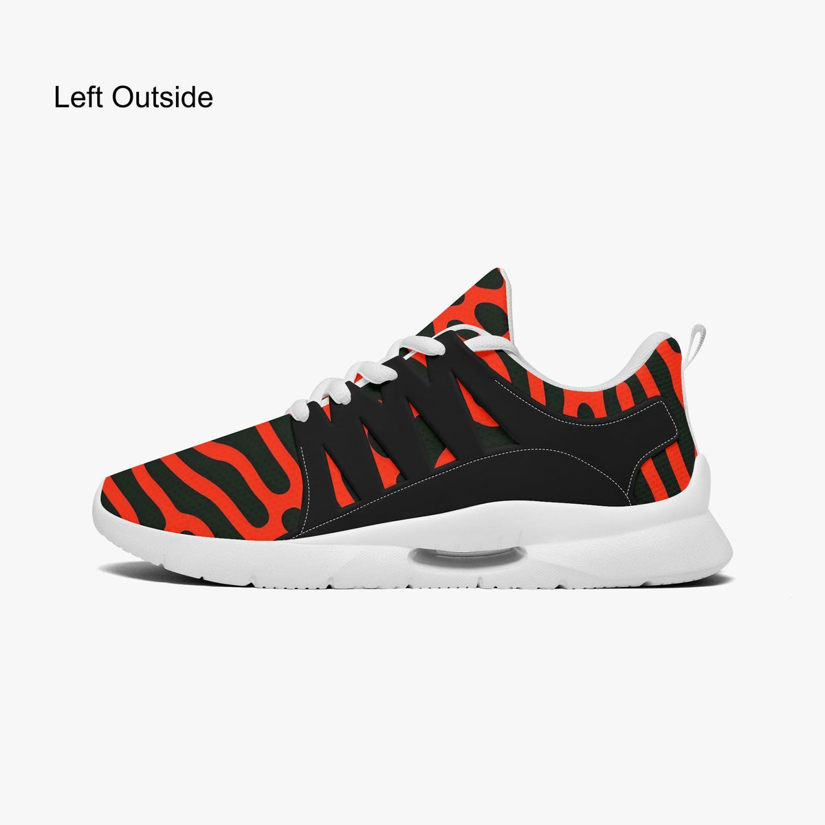 A sneaker with a bold, zebra-striped pattern in red and black colors.