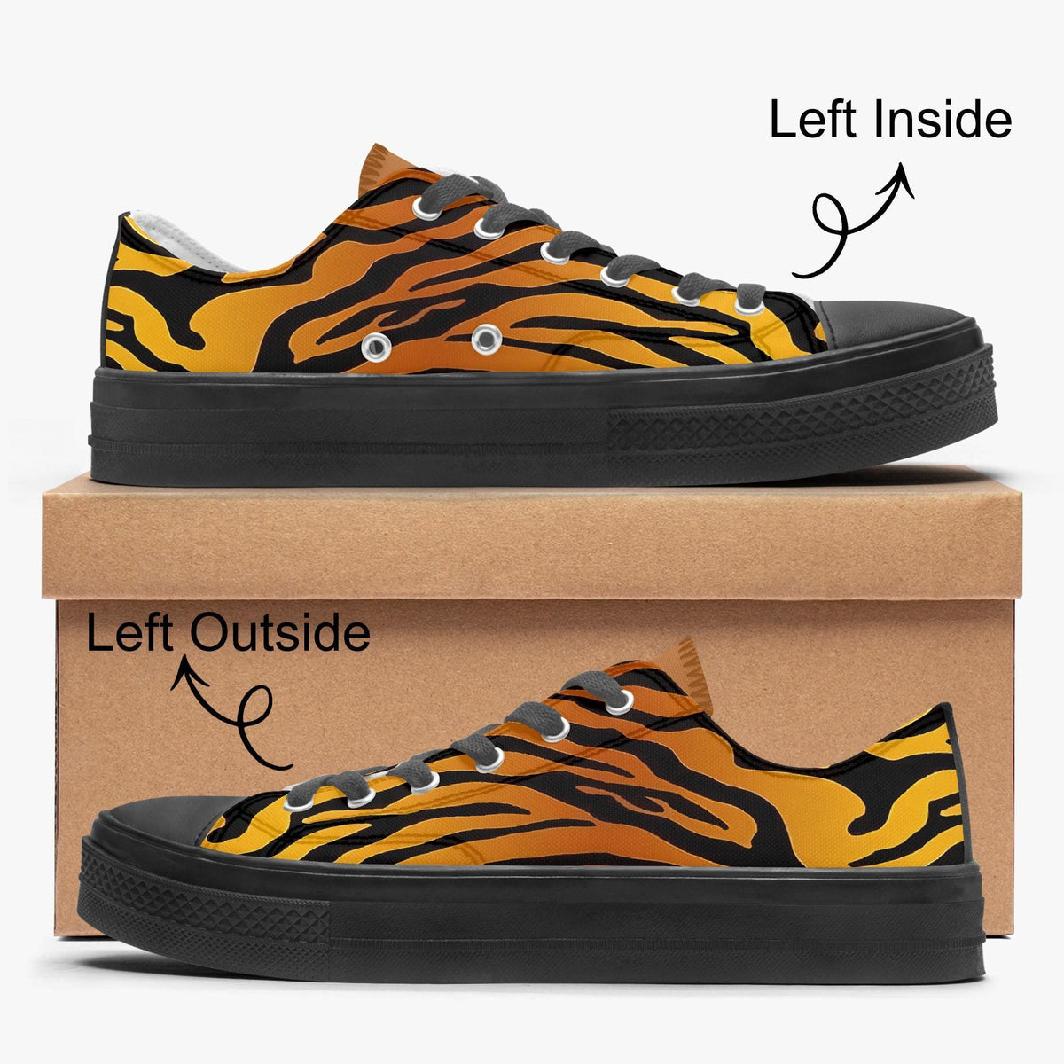 a pair of black and orange tiger-striped sneakers, with one shoe placed on top of a cardboard box and the other shoe placed on the box.