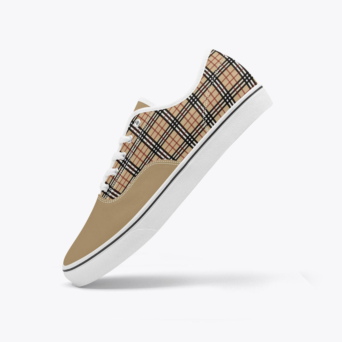 A beige and white plaid sneaker with a white sole and laces is shown against a white background.
