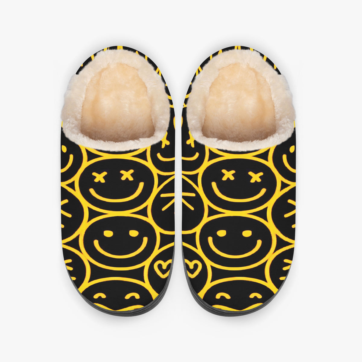 Top-down view of smiley face slippers showing the smiley pattern and cream lining