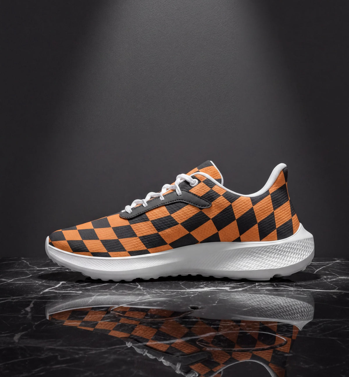 A checkered black and orange sneaker is displayed on a reflective surface, creating a visually striking image.
