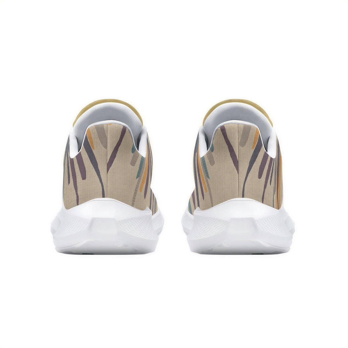 A pair of white sneakers with a colorful abstract pattern on the back.