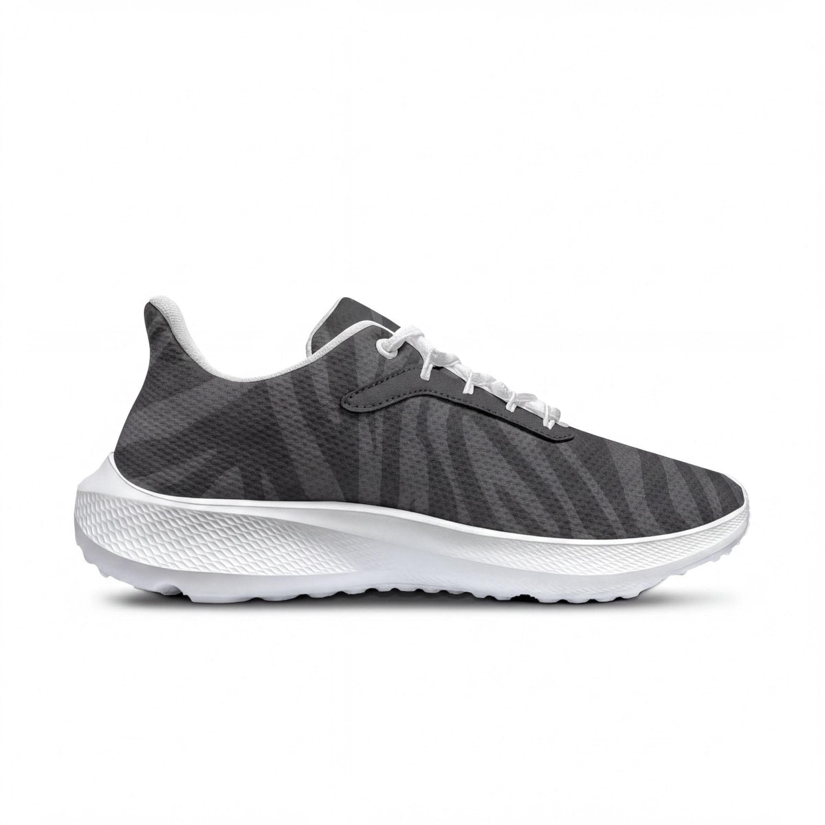 A black and white sneaker with a textured pattern.
