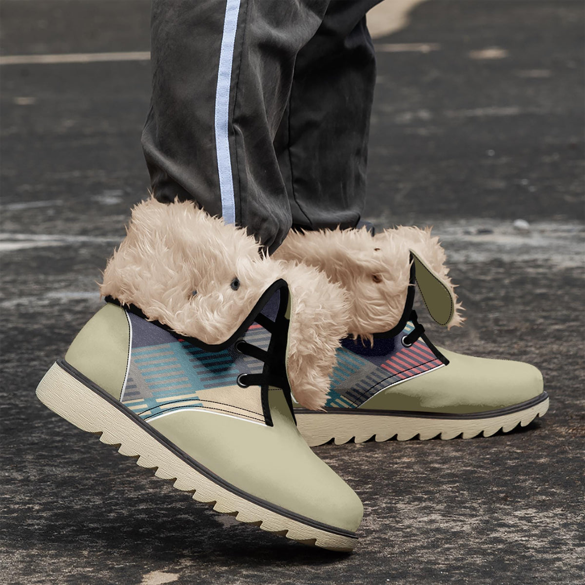 A close-up of a person's feet wearing a pair of white and multicolored boots with fur trim.