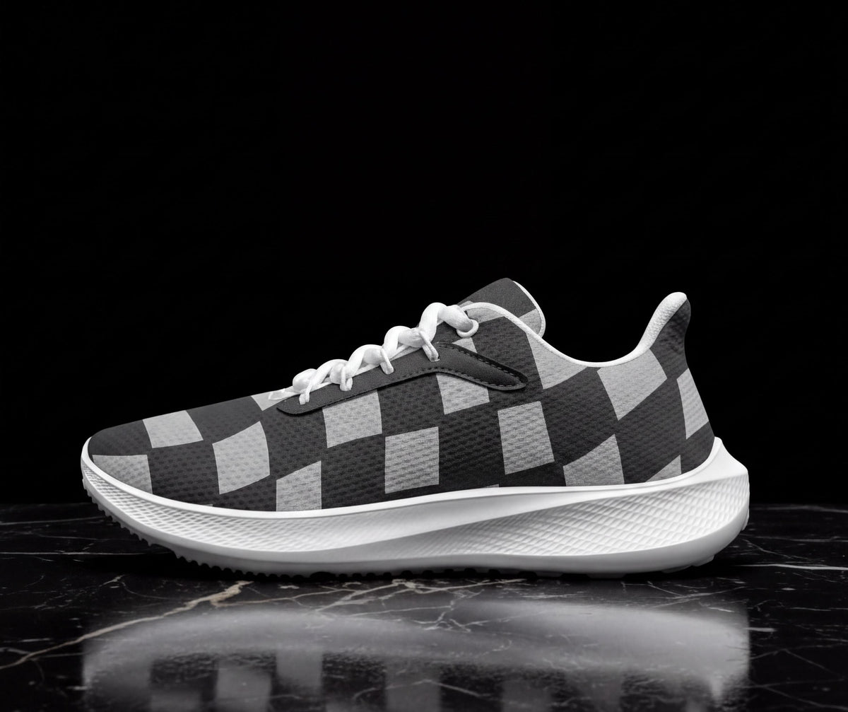A black and white checkered patterned sneaker is displayed on a black marble surface against a black background.