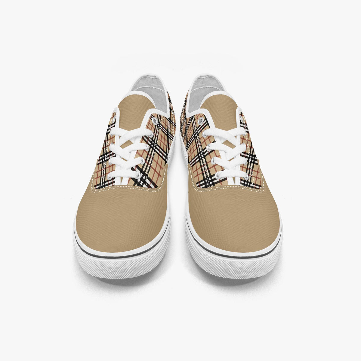 A pair of tan and white sneakers with a plaid pattern on the side.