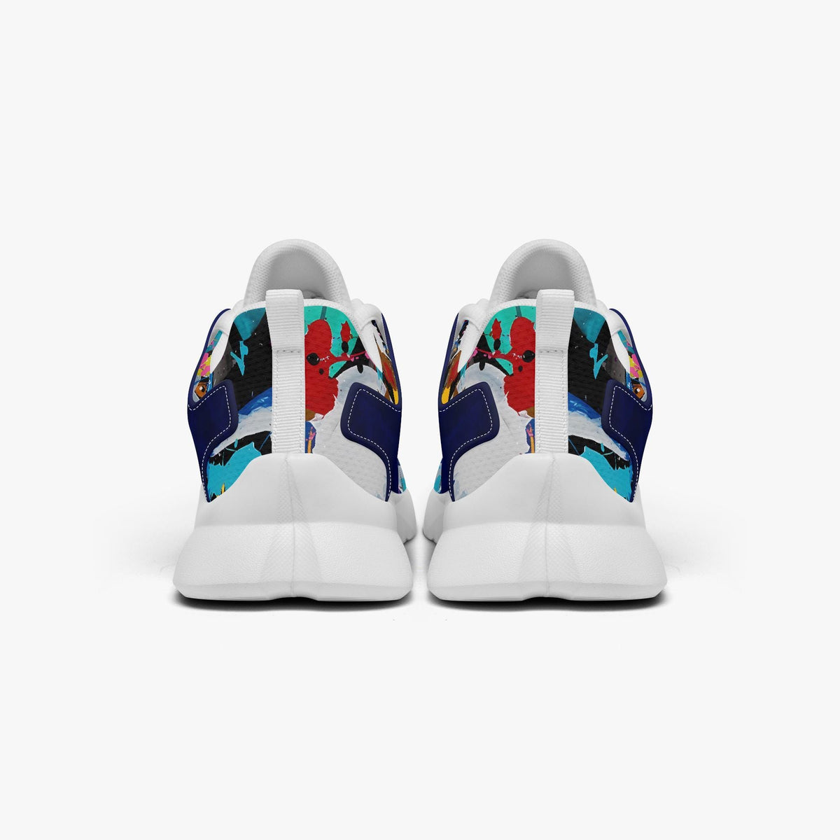 A pair of white sneakers with colorful, abstract designs on the back.