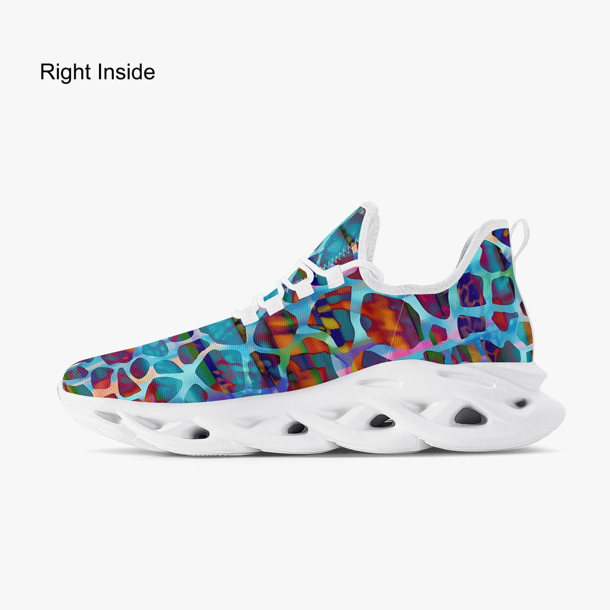 A single sneaker shown in side profile on a light gray background, with the text 'Right Inside' in the upper left. The upper has a vivid abstract multicolor pattern with blue, purple, red, orange, and teal tones, while the sole and laces are white.