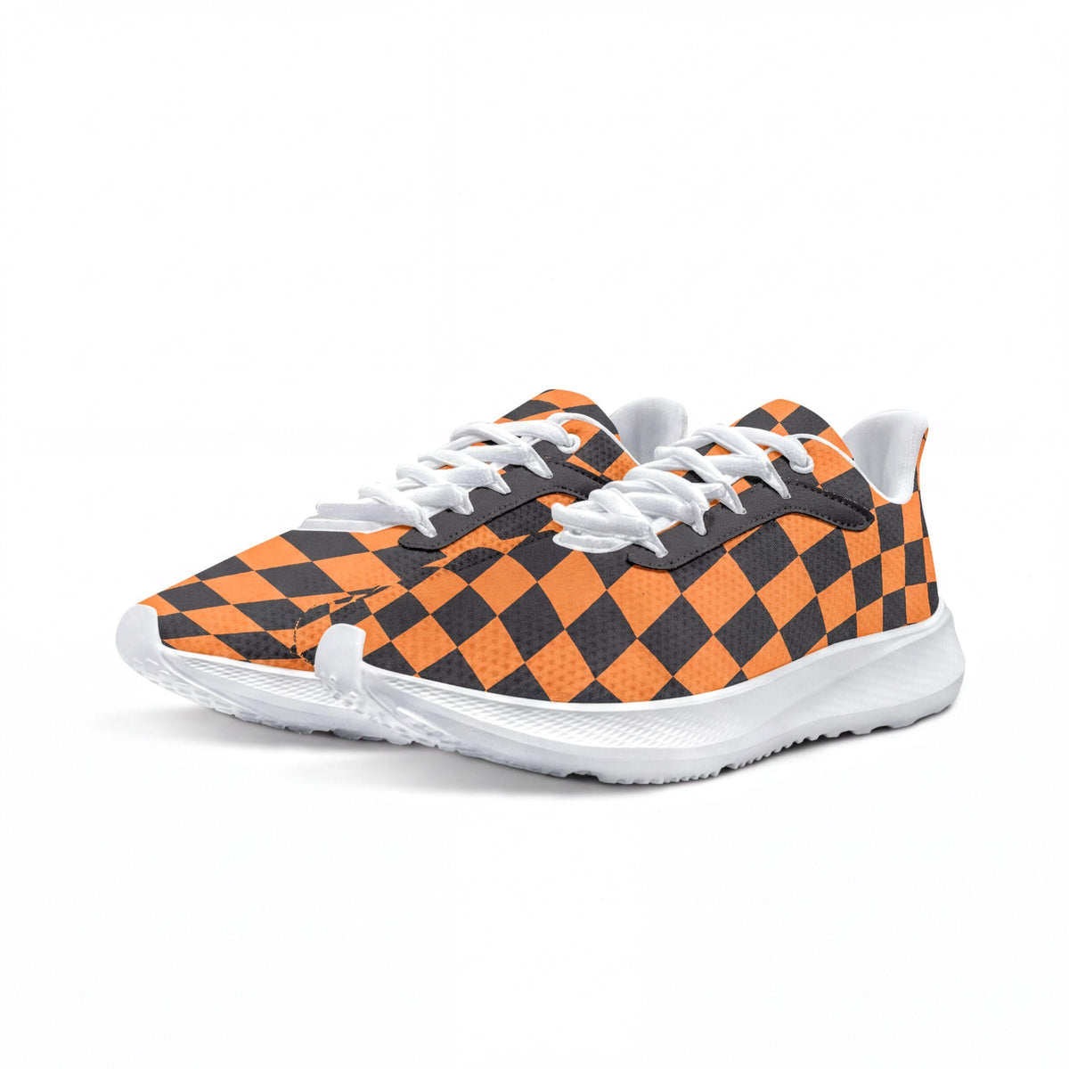 A pair of orange and black checkered sneakers with white laces.