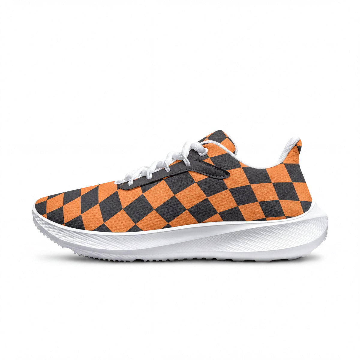 A pair of orange and black checkered sneakers with white laces.