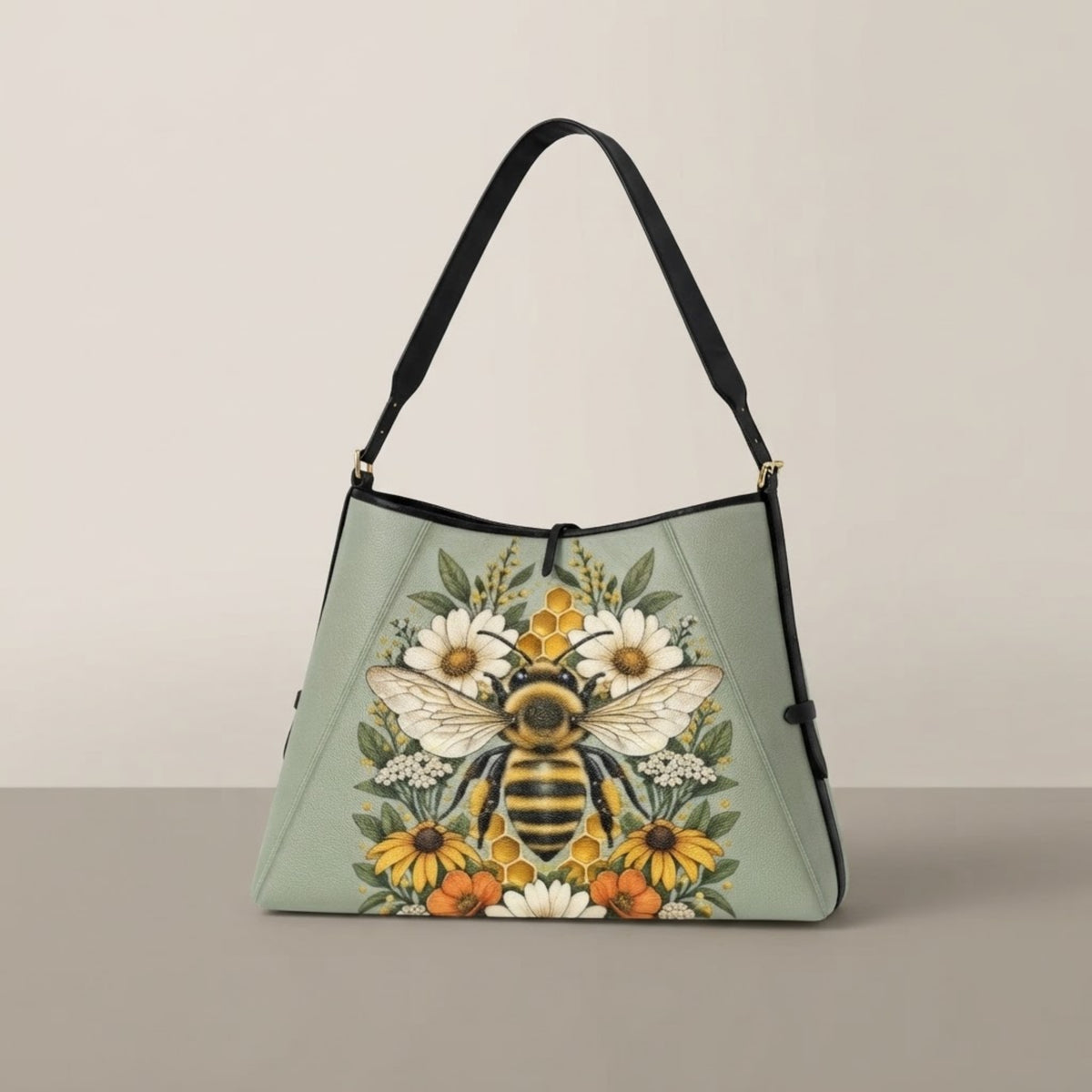 Borsa bee tote verde salvia su sfondo neutro con la stampa dell'ape sul fronte