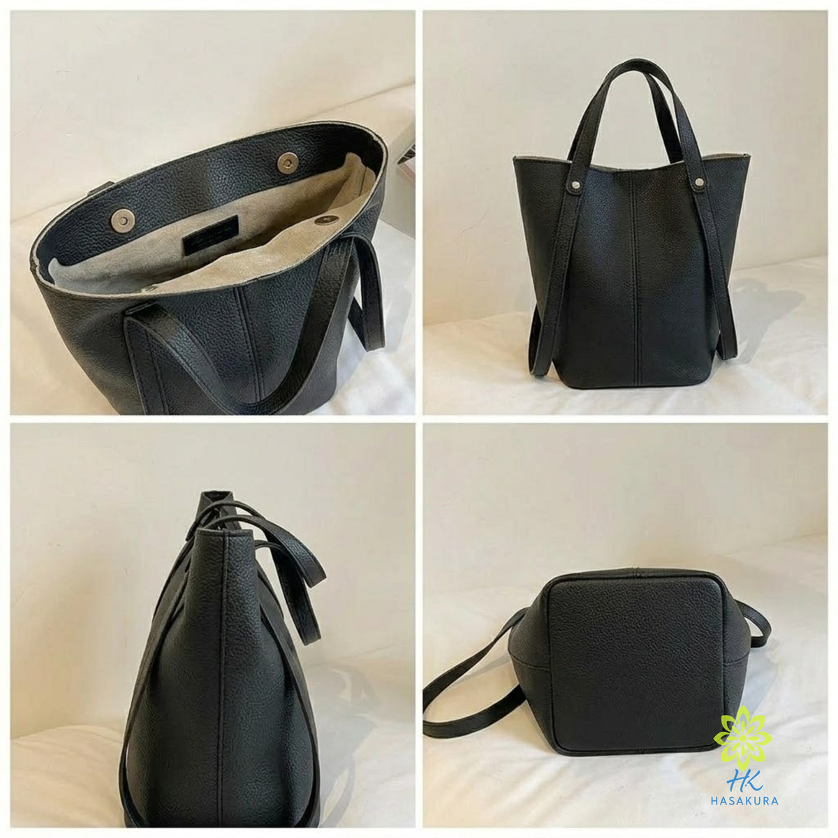 Black tote bag and clutch set on a marble surface with spec callouts
