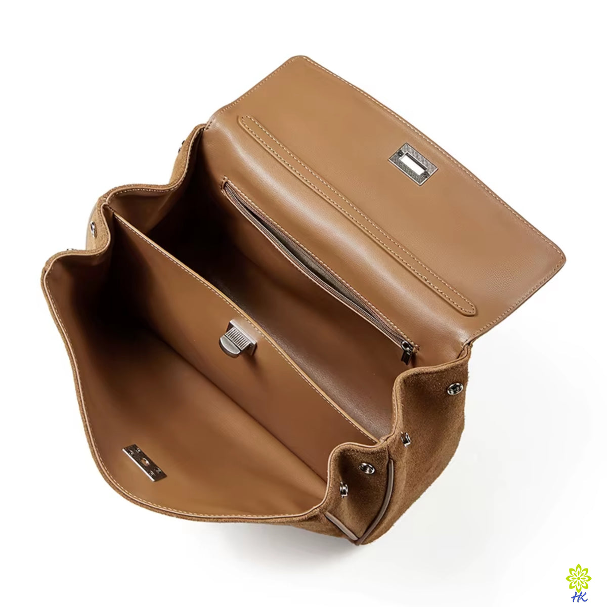Open brown suede tote showing the interior zip pocket and compartments