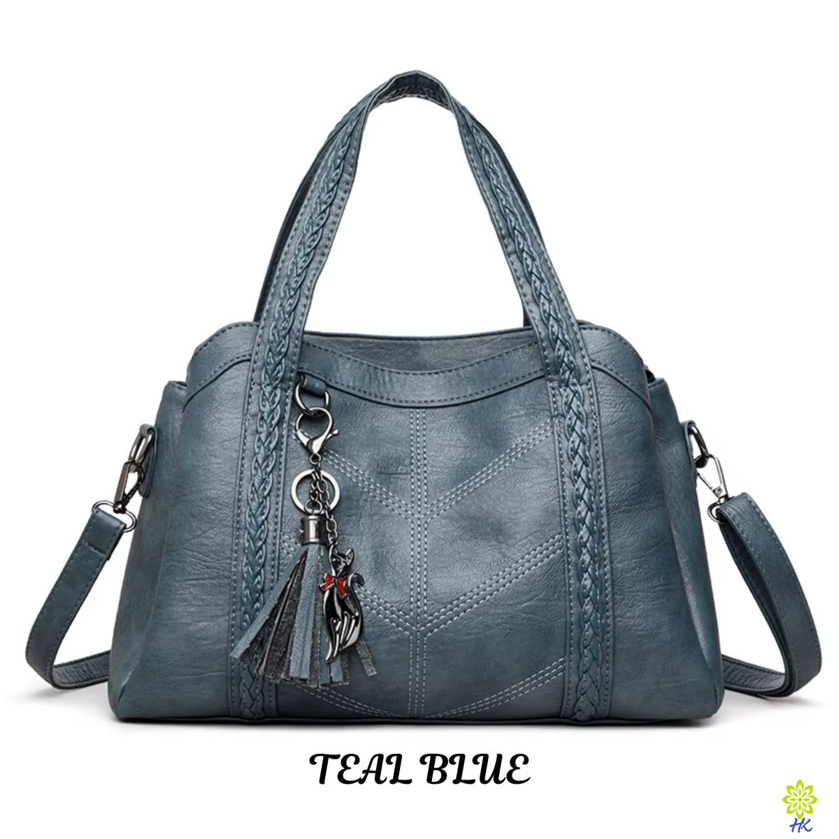 A teal blue faux leather handbag with braided handles, a tassel charm, and a shoulder strap, shown against a white background with 'TEAL BLUE' text below.