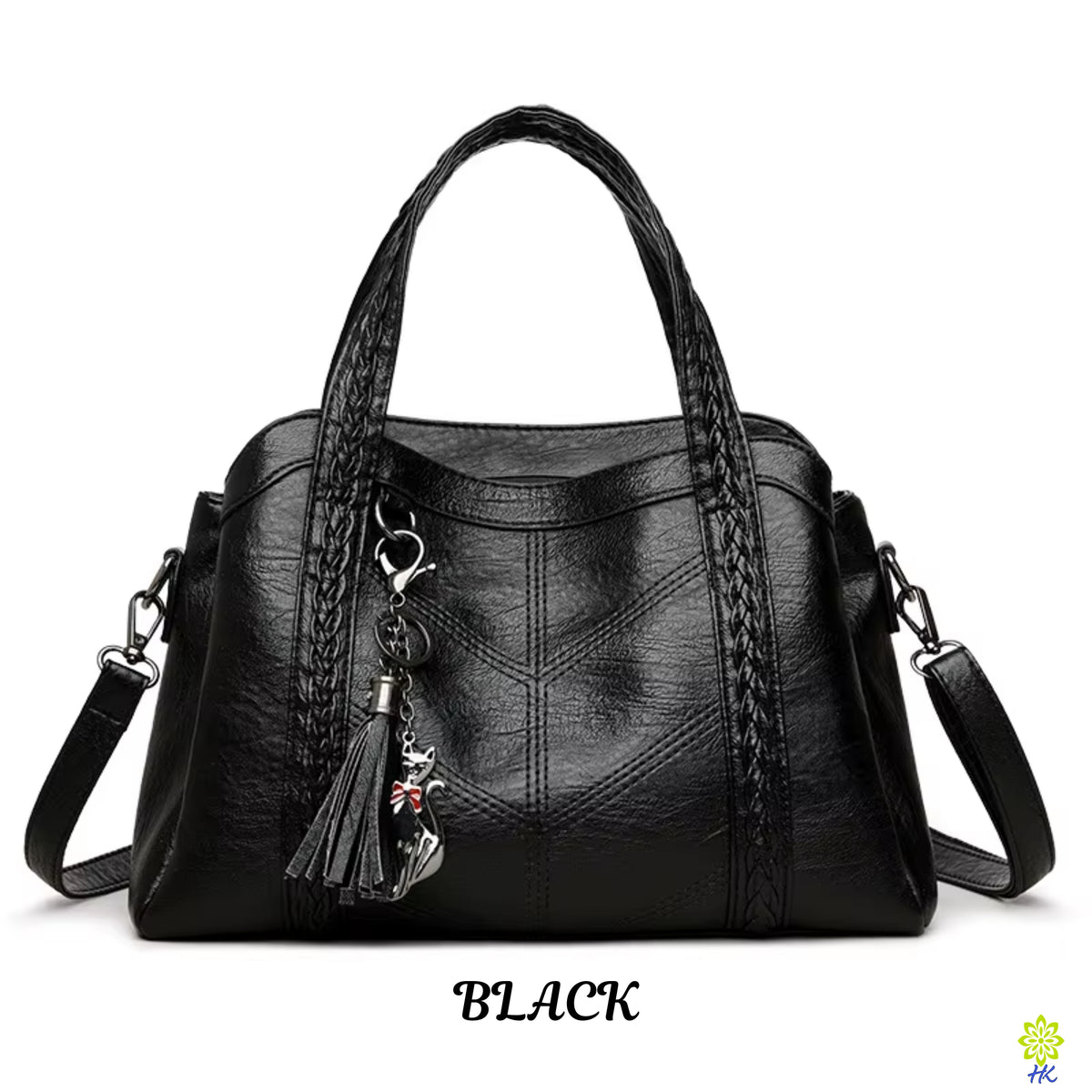 Black handbag with a braided handle and keychain on a white background