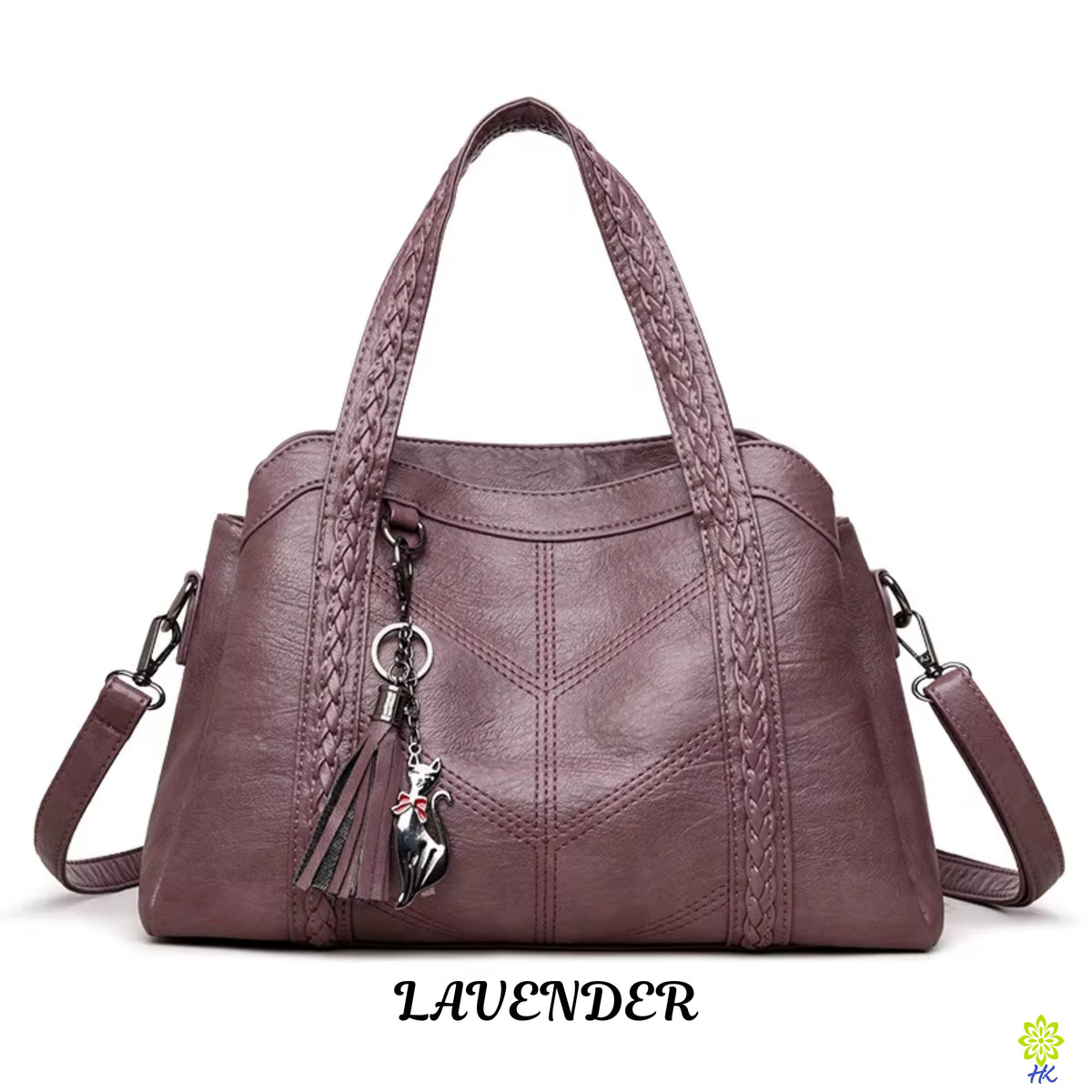 A lavender purple faux leather handbag with braided shoulder straps, a top handle, and a hanging tassel charm, shown against a plain white background with the word 'LAVENDER' printed below.