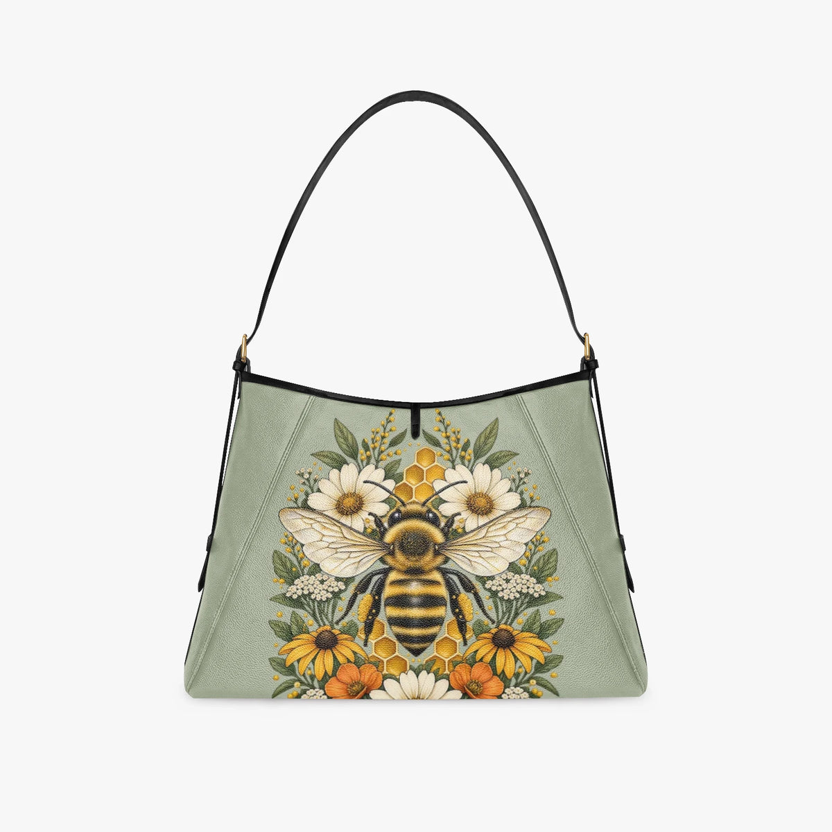 Modella con la borsa tote verde salvia in mano su un acciottolato