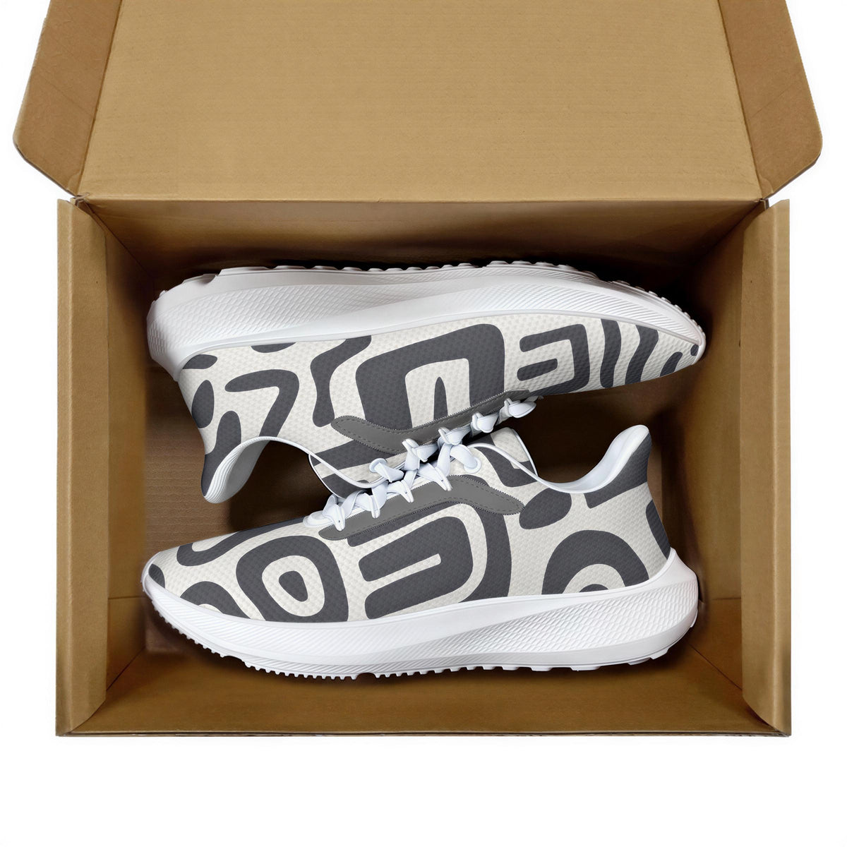 A pair of white and gray sneakers with a patterned design inside a cardboard box.