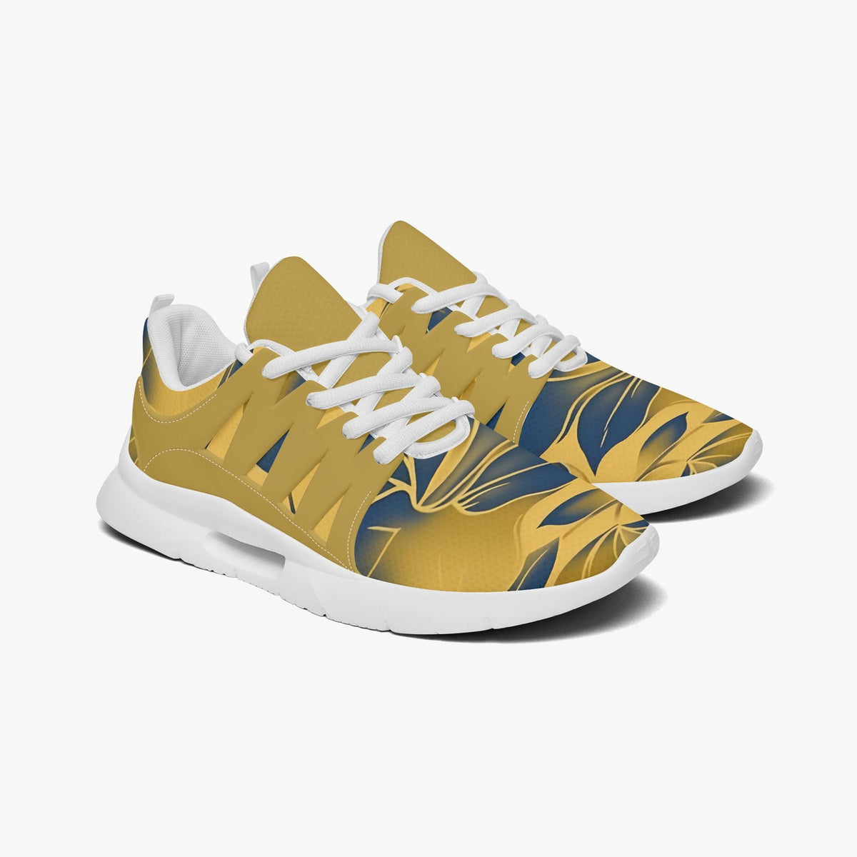 A pair of yellow and blue patterned sneakers with white laces.