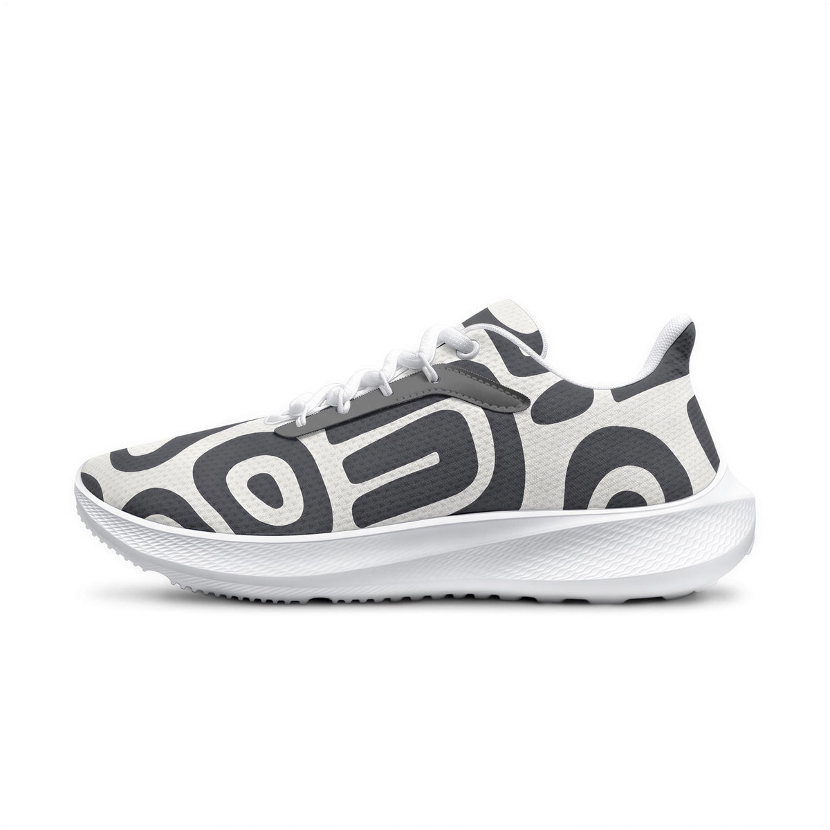 A pair of white and black sneakers with a distinctive black and white pattern.